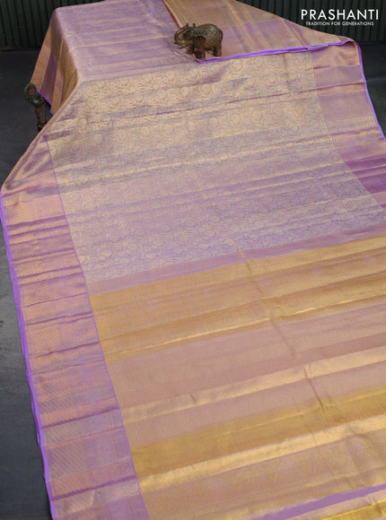 Kanchipuram tissue silk saree dual shade of lavender with allover silver zari woven brocade weaves and zari woven border