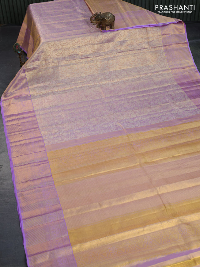 Kanchipuram tissue silk saree dual shade of lavender with allover silver zari woven brocade weaves and zari woven border