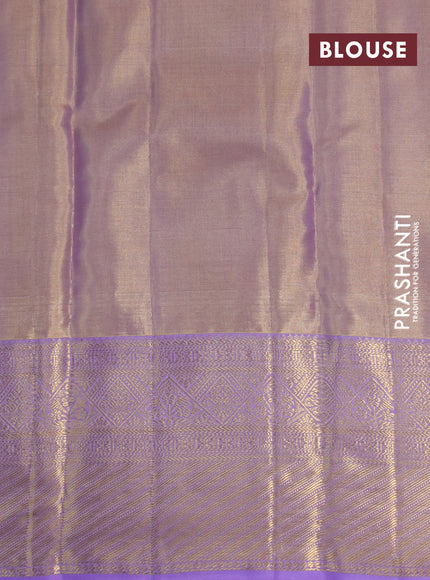 Kanchipuram tissue silk saree dual shade of lavender with allover silver zari woven brocade weaves and zari woven border