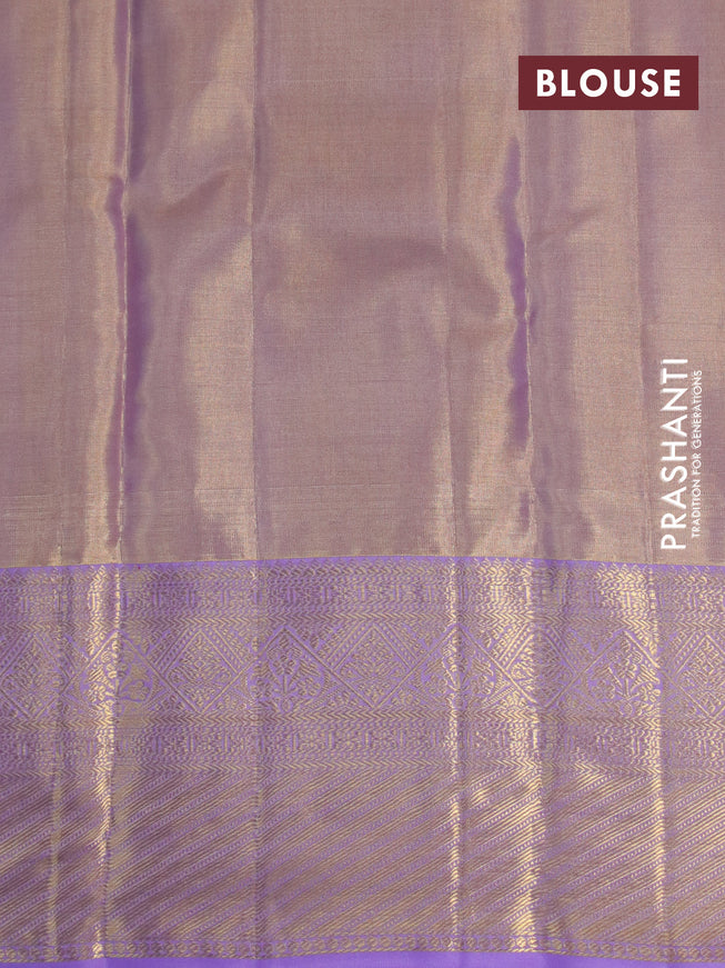 Kanchipuram tissue silk saree dual shade of lavender with allover silver zari woven brocade weaves and zari woven border