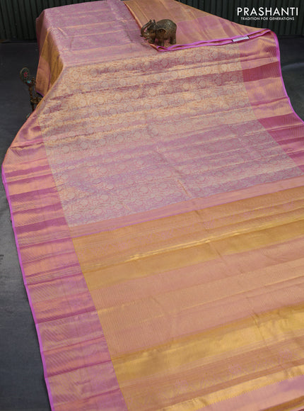 Kanchipuram tissue silk saree dual shade of light pink with allover silver zari woven brocade weaves and zari woven border