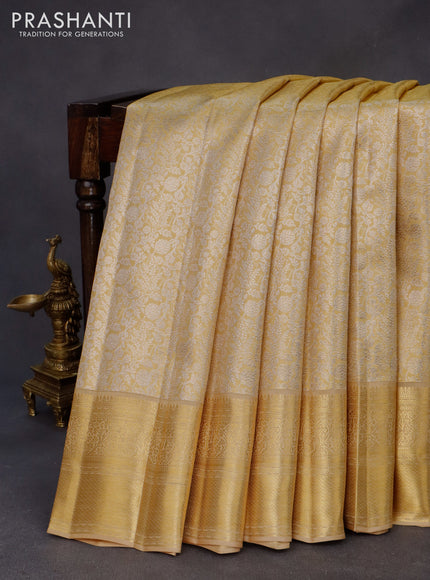 Kanchipuram tissue silk saree dual shade of gold with allover silver zari woven brocade weaves and zari woven border