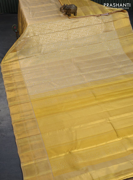 Kanchipuram tissue silk saree dual shade of gold with allover silver zari woven brocade weaves and zari woven border