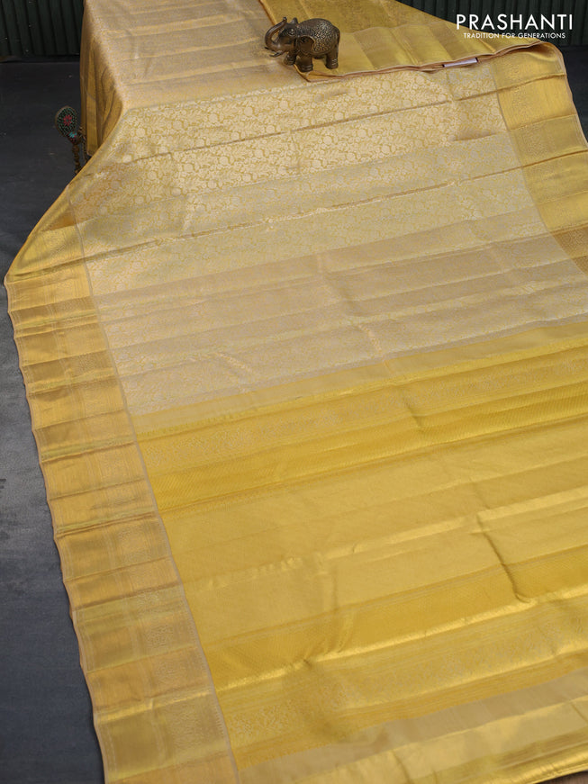 Kanchipuram tissue silk saree dual shade of gold with allover silver zari woven brocade weaves and zari woven border