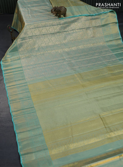 Kanchipuram tissue silk saree dual shade of teal blue with allover zari woven brocade weaves and long zari woven border