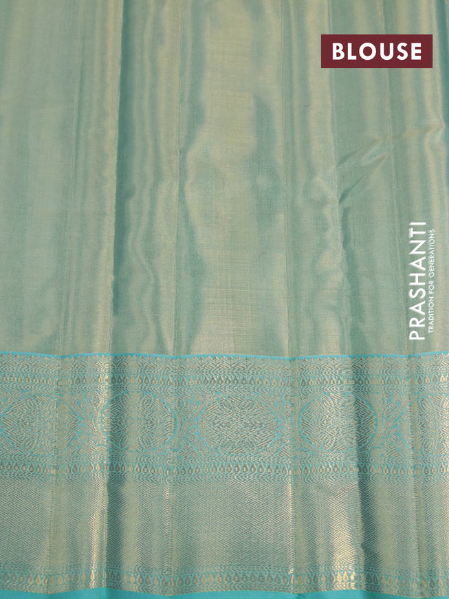 Kanchipuram tissue silk saree dual shade of teal blue with allover zari woven brocade weaves and long zari woven border