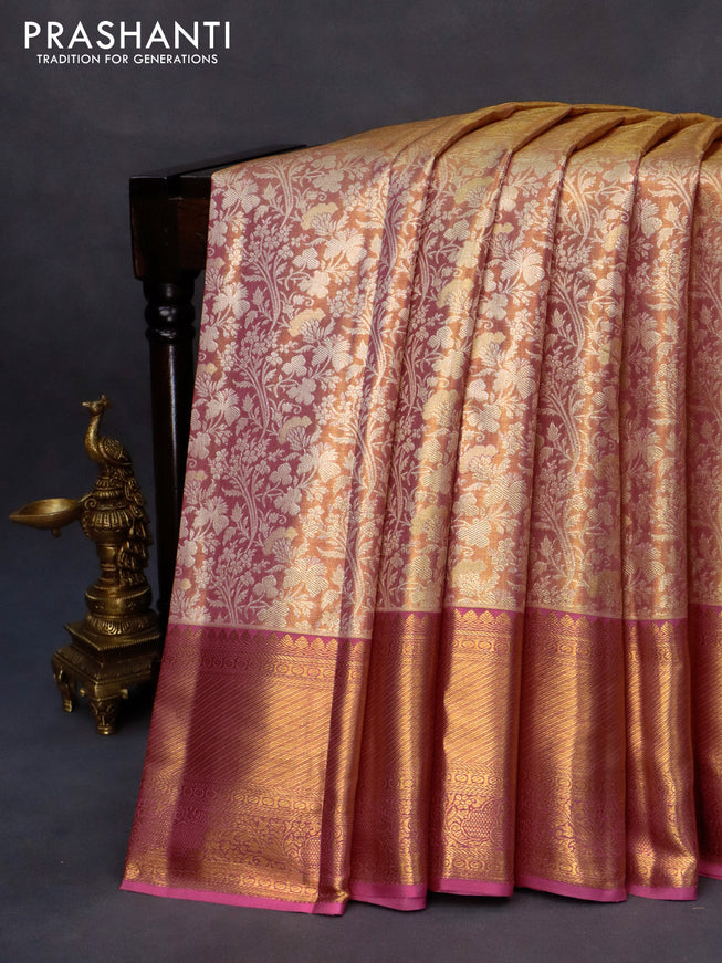 Kanchipuram tissue silk saree dual shade of peach and pink with allover zari woven floral brocade weaves and long zari woven border