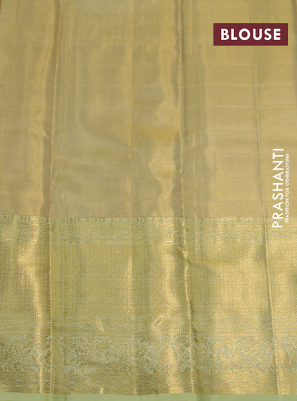 Kanchipuram tissue silk saree gold and mild pista green with allover zari woven floral brocade weaves and zari woven border