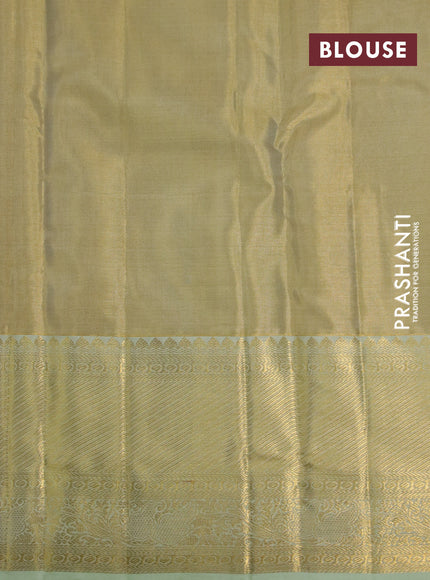 Kanchipuram tissue silk saree gold and mild pista green with allover zari woven brocade weaves and long zari woven border