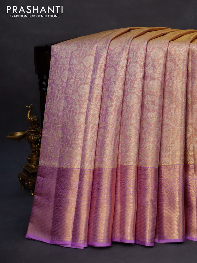 Kanchipuram tissue silk saree dual shade of mild lavender and lavender with allover zari woven brocade weaves and long zari woven border