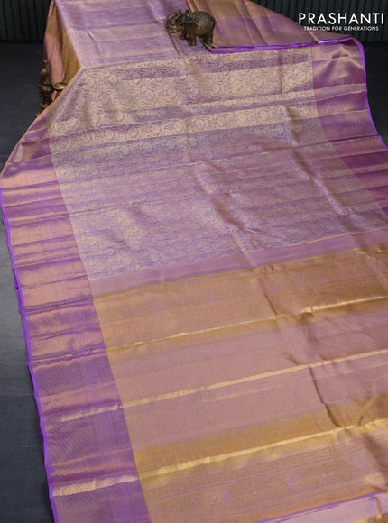 Kanchipuram tissue silk saree dual shade of mild lavender and lavender with allover zari woven brocade weaves and long zari woven border