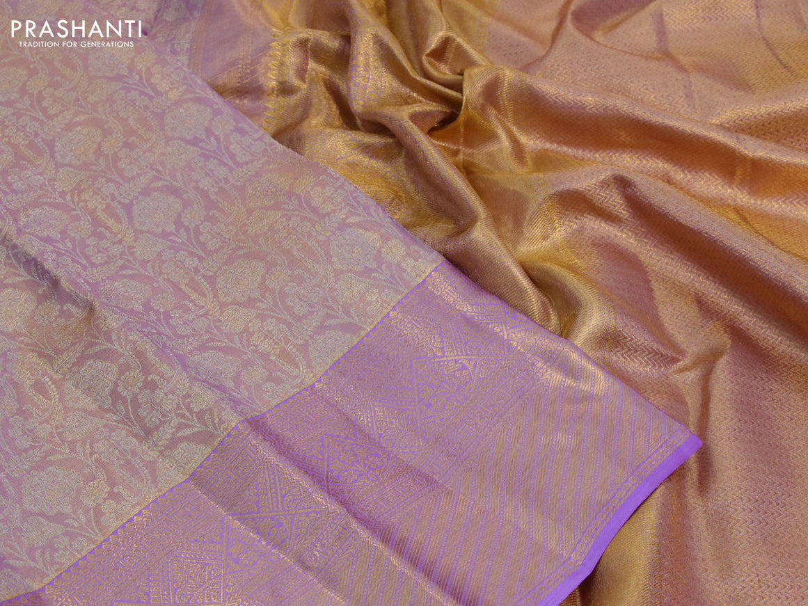 Kanchipuram tissue silk saree dual shade of mild lavender and lavender with allover zari woven brocade weaves and long zari woven border