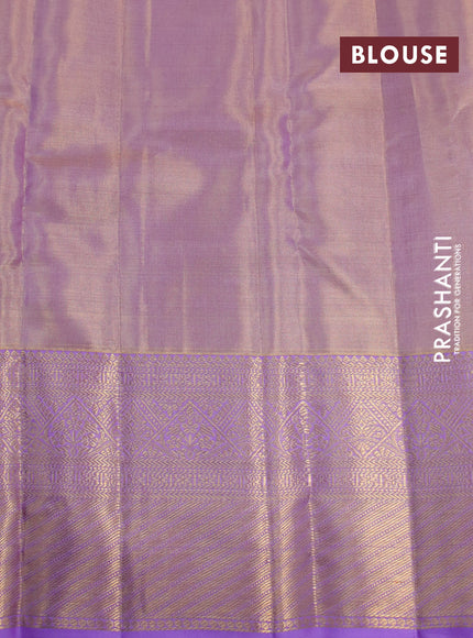 Kanchipuram tissue silk saree dual shade of mild lavender and lavender with allover zari woven brocade weaves and long zari woven border