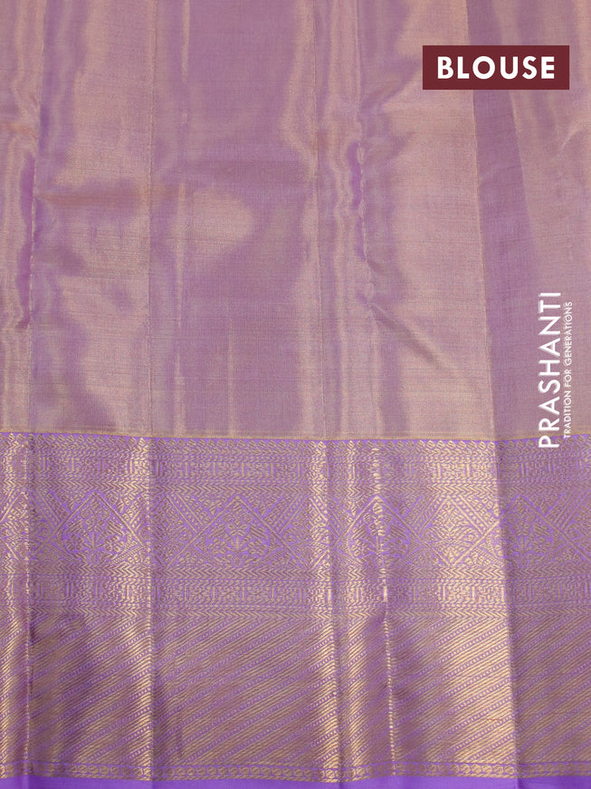 Kanchipuram tissue silk saree dual shade of mild lavender and lavender with allover zari woven brocade weaves and long zari woven border