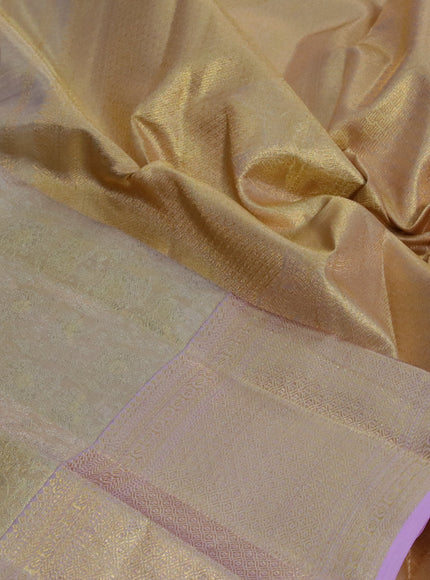 Kanchipuram tissue silk saree dual shade of gold and lotus pink with allover zari woven brocade weaves and long zari woven border