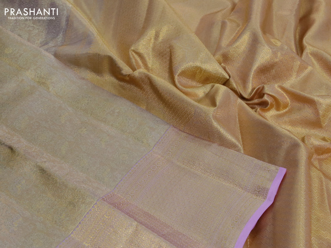 Kanchipuram tissue silk saree dual shade of gold and lotus pink with allover zari woven brocade weaves and long zari woven border