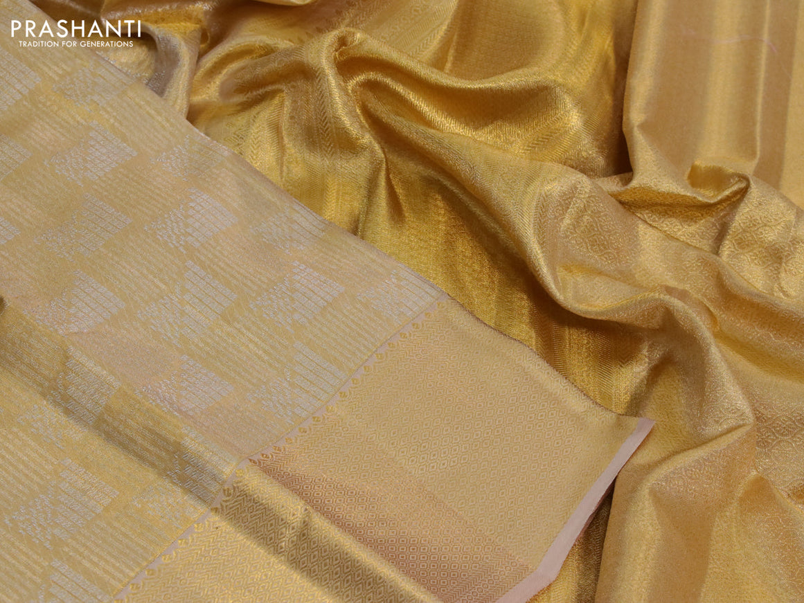 Kanchipuram tissue silk saree gold and sandal with allover zari woven geometric brocade weaves and zari woven border