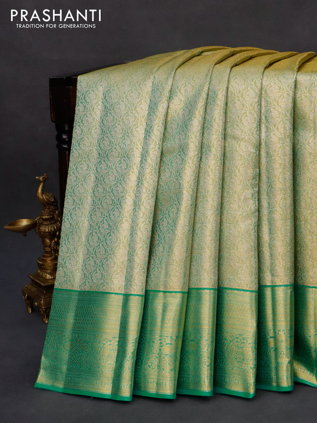 Kanchipuram tissue silk saree dual shade of teal and teal blue with allover zari woven brocade weaves and zari woven border