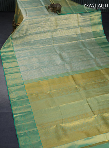 Kanchipuram tissue silk saree dual shade of teal and teal blue with allover zari woven brocade weaves and zari woven border