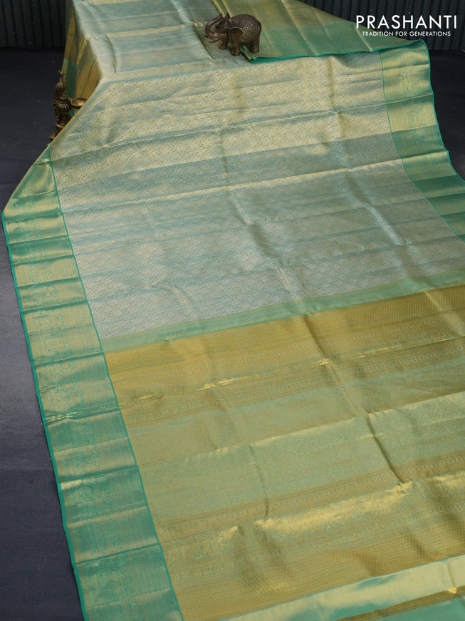 Kanchipuram tissue silk saree dual shade of teal and teal blue with allover zari woven brocade weaves and zari woven border