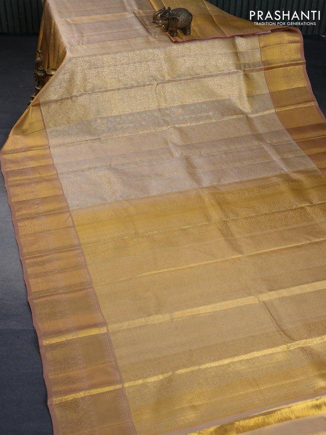 Kanchipuram tissue silk saree gold and dark sandal with allover silver zari woven brocade weaves and zari woven border