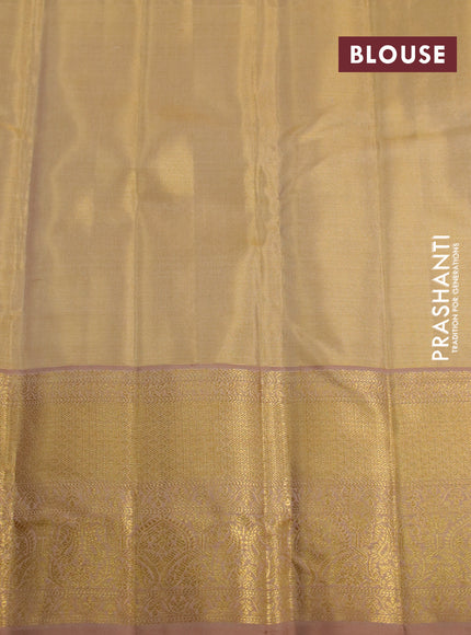 Kanchipuram tissue silk saree gold and dark sandal with allover silver zari woven brocade weaves and zari woven border