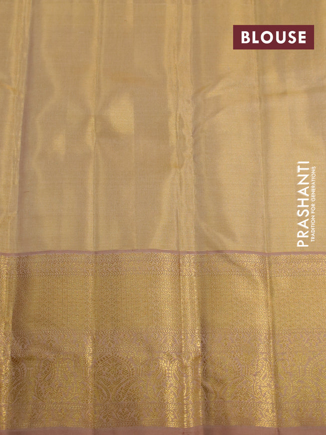 Kanchipuram tissue silk saree gold and dark sandal with allover silver zari woven brocade weaves and zari woven border