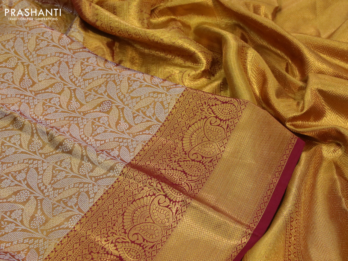 Kanchipuram tissue silk saree gold and maroon with allover silver zari woven brocade weaves and zari woven border