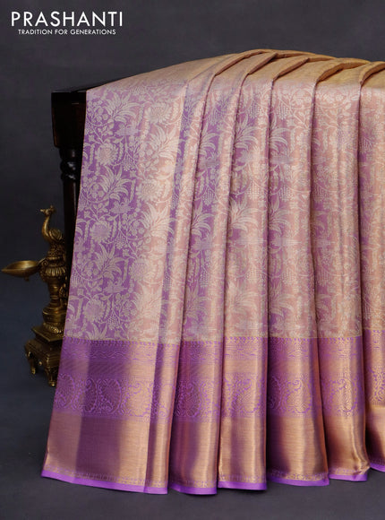 Kanchipuram tissue silk saree dual shade of lavender with allover silver zari woven brocade weaves and zari woven border