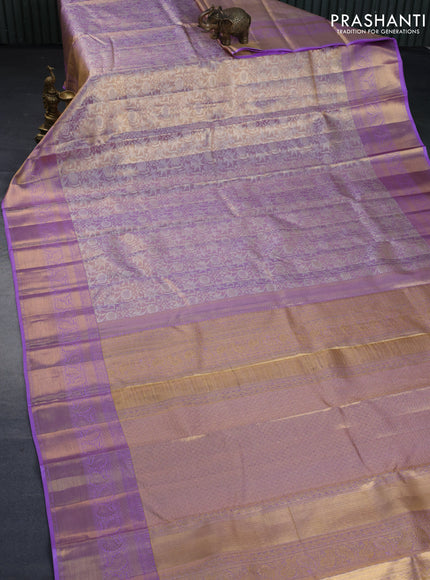 Kanchipuram tissue silk saree dual shade of lavender with allover silver zari woven brocade weaves and zari woven border