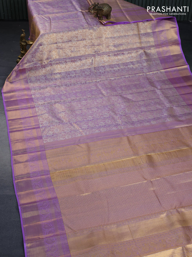 Kanchipuram tissue silk saree dual shade of lavender with allover silver zari woven brocade weaves and zari woven border