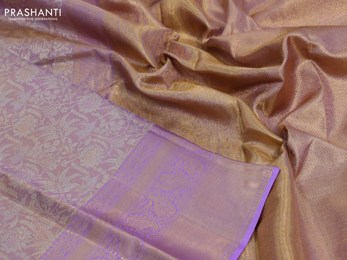 Kanchipuram tissue silk saree dual shade of lavender with allover silver zari woven brocade weaves and zari woven border