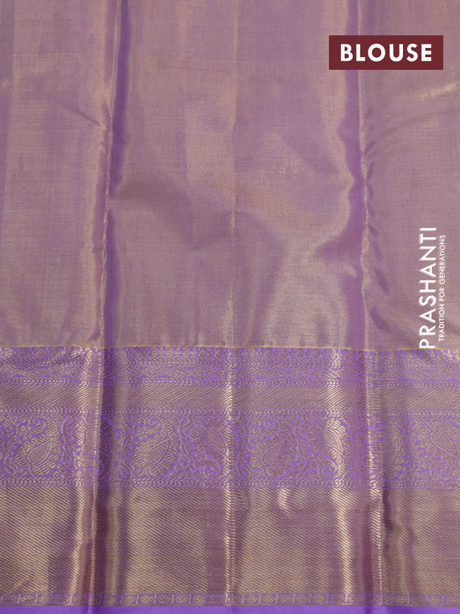 Kanchipuram tissue silk saree dual shade of lavender with allover silver zari woven brocade weaves and zari woven border