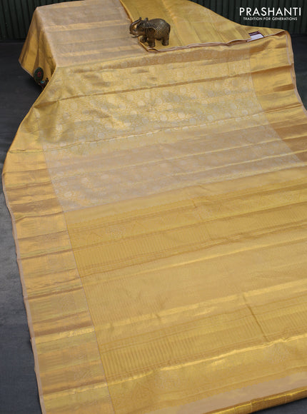 Kanchipuram tissue silk saree gold and beige with allover zari woven floral brocade weaves and zari woven border