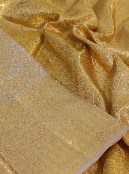 Kanchipuram tissue silk saree gold and beige with allover zari woven floral brocade weaves and zari woven border