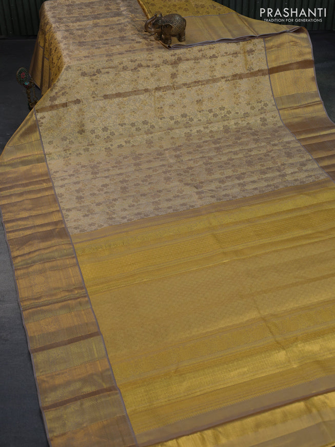 Kanchipuram tissue silk saree gold and grey with allover silver zari woven brocade weaves and zari woven border