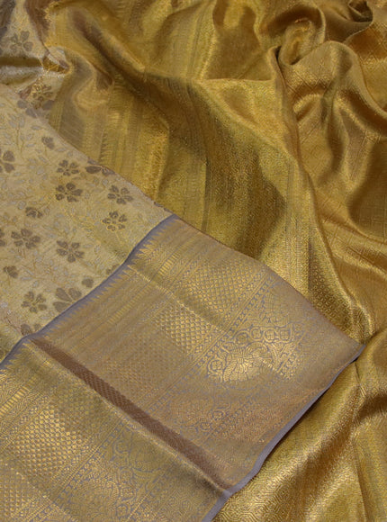 Kanchipuram tissue silk saree gold and grey with allover silver zari woven brocade weaves and zari woven border