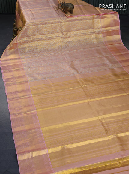 Kanchipuram tissue silk saree dual shade of gold and light pink with allover silver zari woven brocade weaves and zari woven border