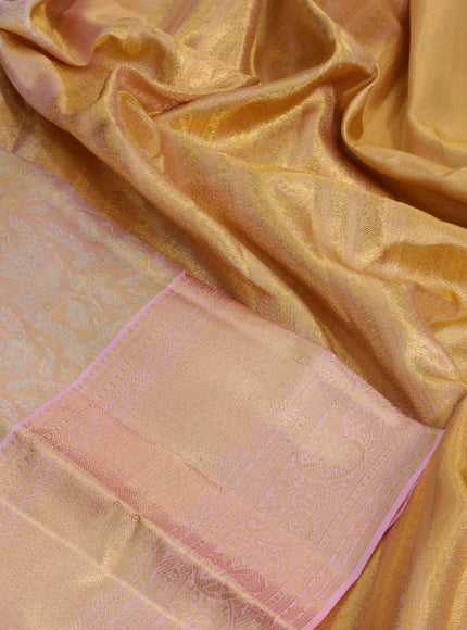 Kanchipuram tissue silk saree dual shade of gold and light pink with allover silver zari woven brocade weaves and zari woven border