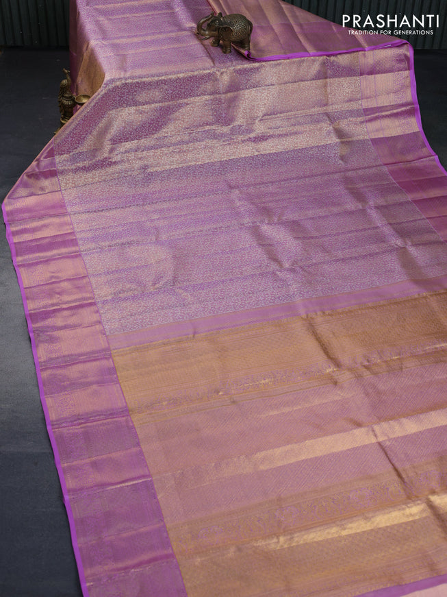 Kanchipuram tissue silk saree dual shade of mild lavender and lavender with allover zari woven brocade weaves and zari woven border