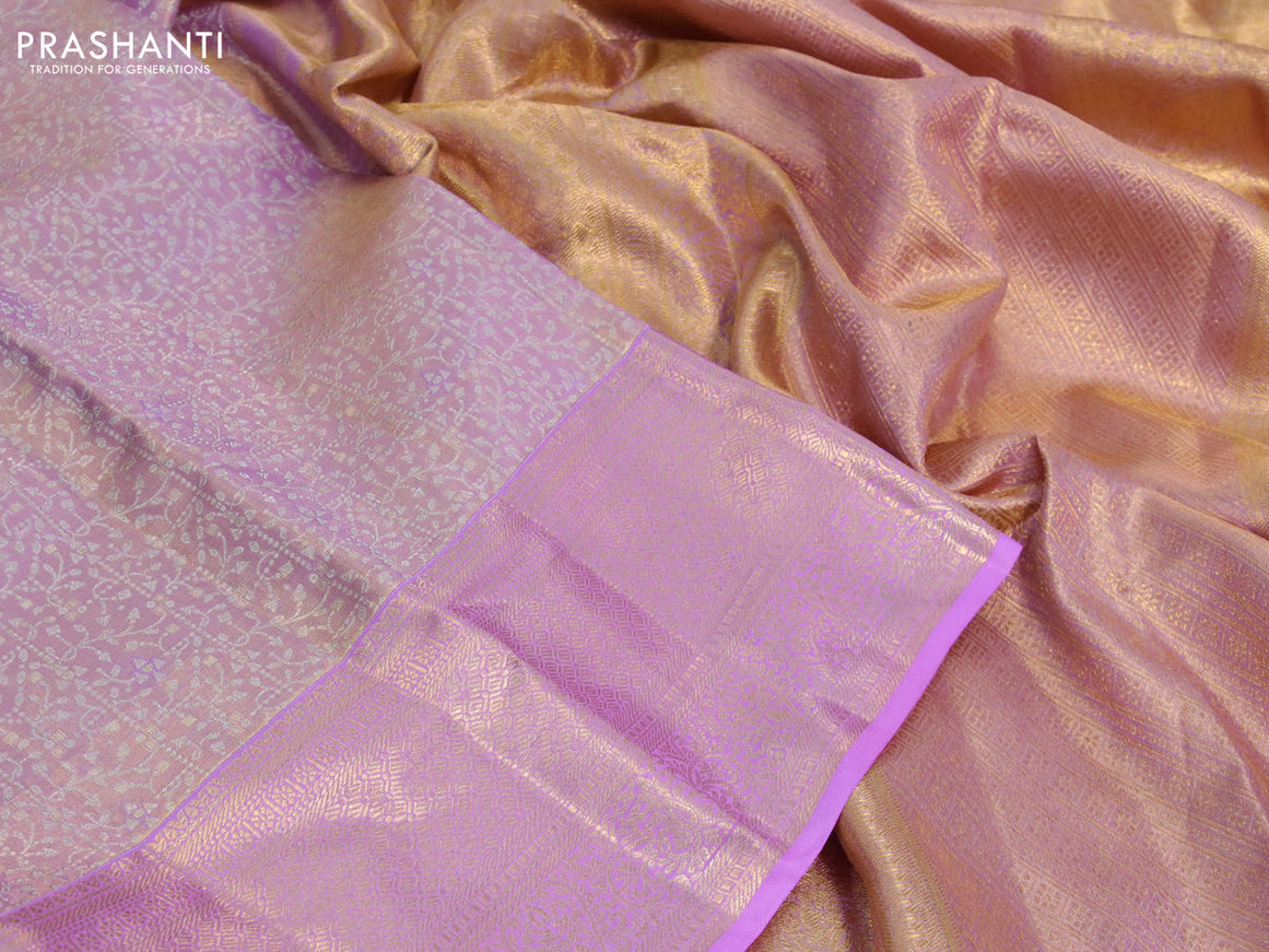 Kanchipuram tissue silk saree dual shade of mild lavender and lavender with allover zari woven brocade weaves and zari woven border