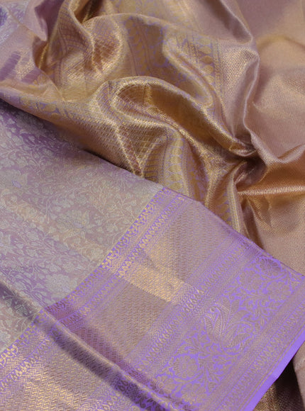 Kanchipuram tissue silk saree dual shade of mild lavender with allover silver zari woven brocade weaves and long zari woven border