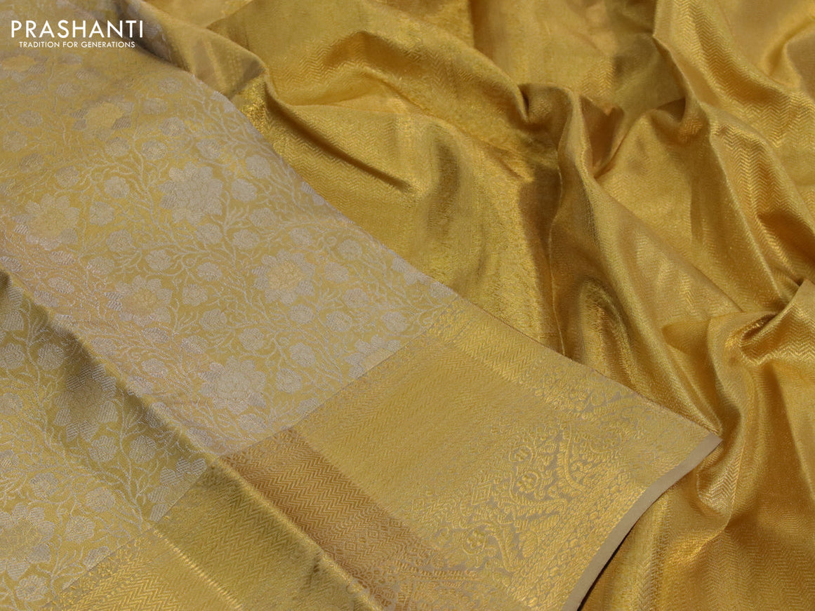 Kanchipuram tissue silk saree gold and sandal with allover silver zari woven brocade weaves and long zari woven border