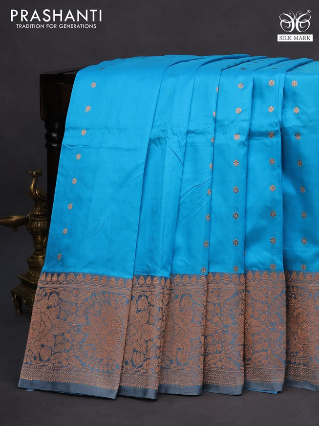 Banarasi katan silk saree light blue shade and grey with copper zari woven buttas and copper zari woven border