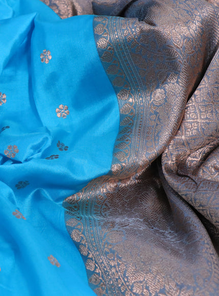 Banarasi katan silk saree light blue shade and grey with copper zari woven buttas and copper zari woven border