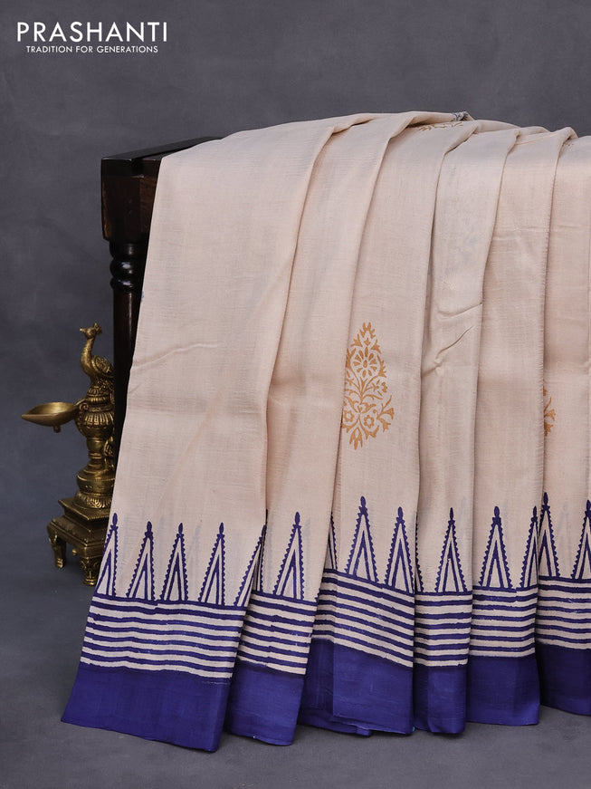 Bishnupuri silk saree cream and blue with plain body and temple design simple border