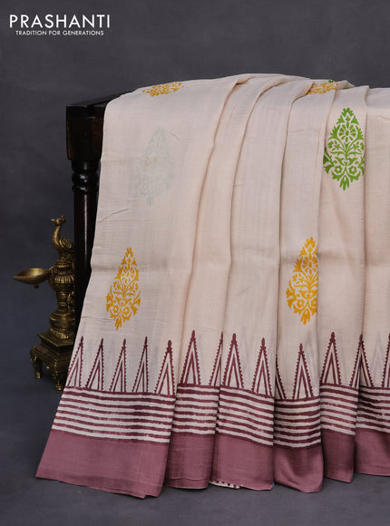 Bishnupuri silk saree beige and pastel brown with plain body and temple design simple border