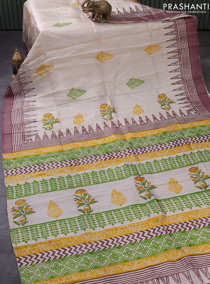 Bishnupuri silk saree beige and pastel brown with plain body and temple design simple border