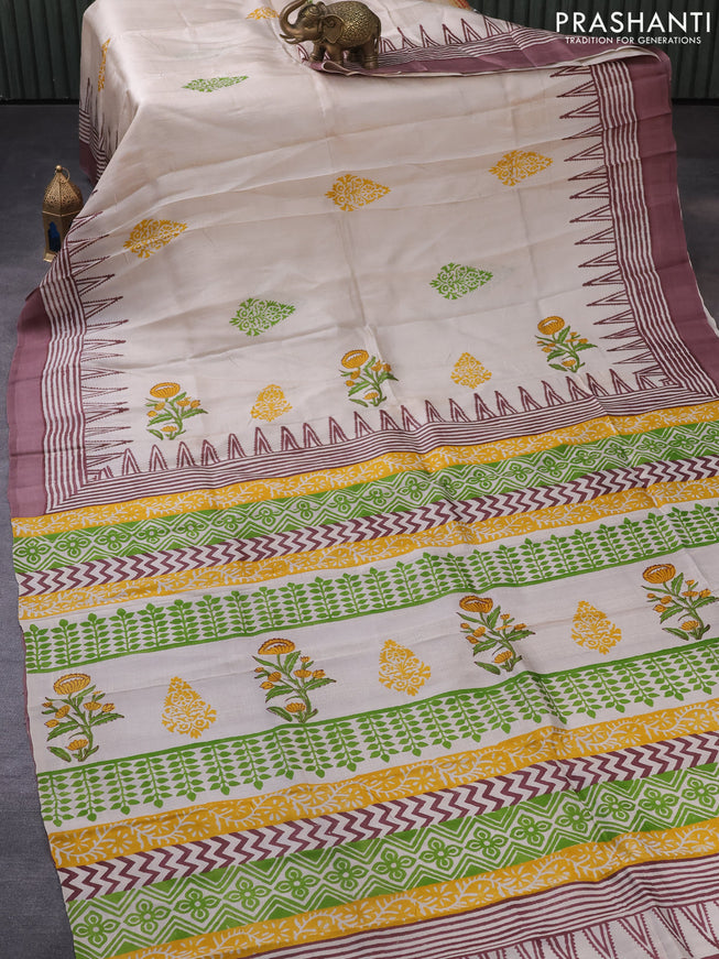 Bishnupuri silk saree beige and pastel brown with plain body and temple design simple border