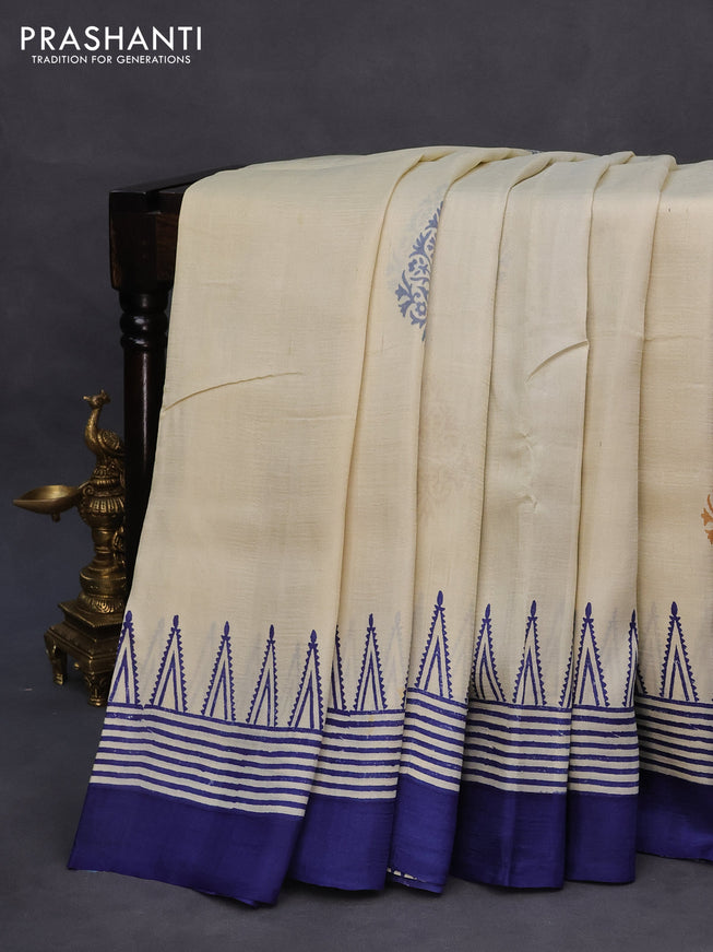 Bishnupuri silk saree cream and blue with plain body and temple design simple border